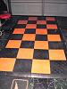 Harley black and orange 4x8 tile bike floor with edging-harley-floor.jpg