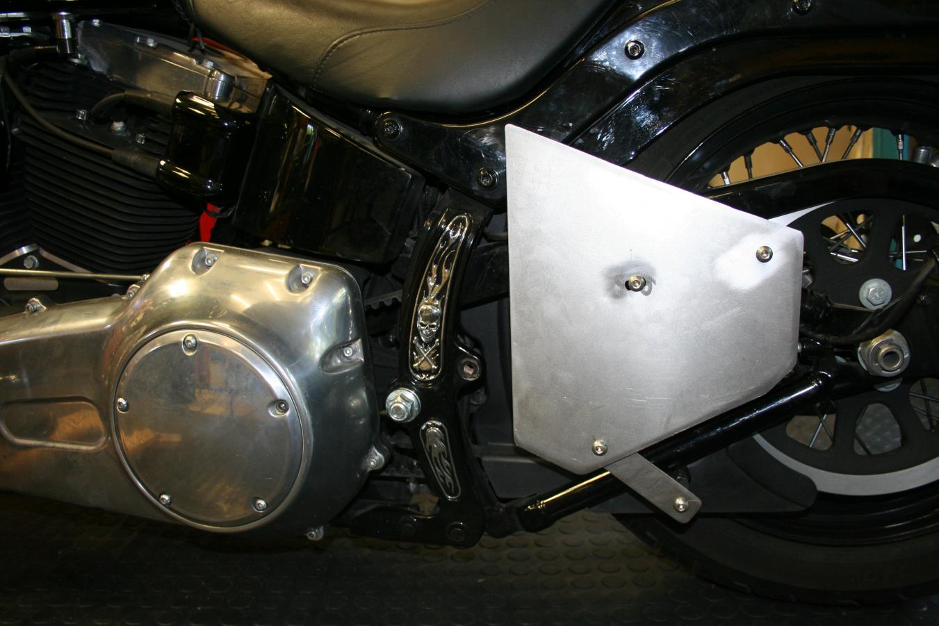 Swing arm shop bag mount