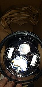 harley fatboy headlight replacement