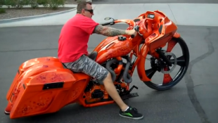 HARDLY DANGEROUS A Bright Orange, Big-Wheeled Bagger