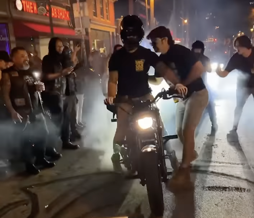 Man Grabs Harley-Davidson Stunt Rider